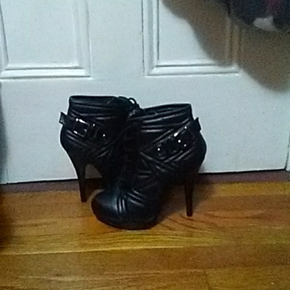Unworn black booties